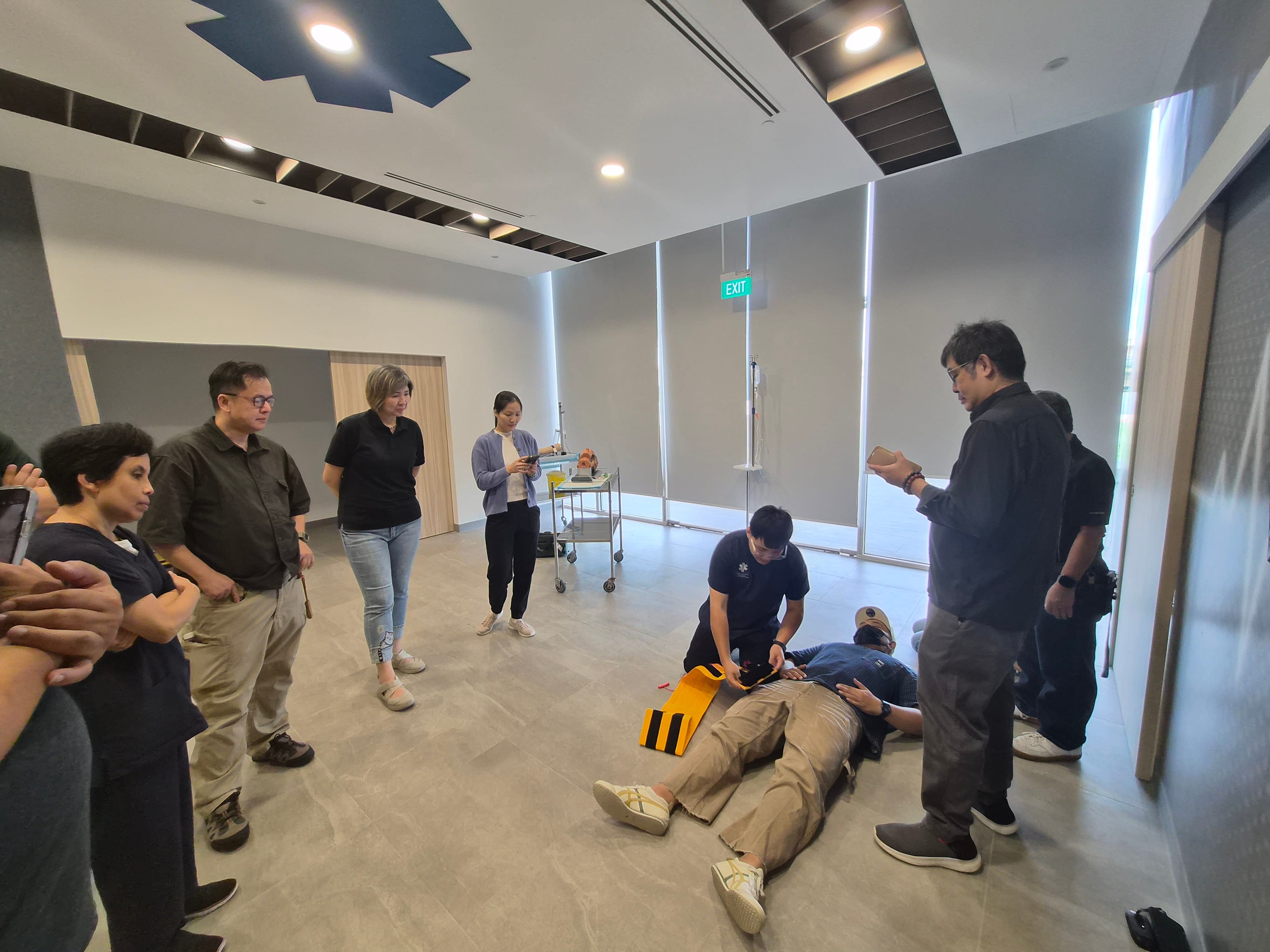 Demonstration on the use of pelvic binder
